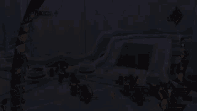 a group of people are playing a video game and one of them is holding a sword .