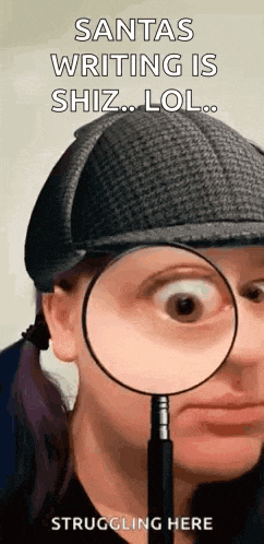 a woman in a hat is holding a magnifying glass in front of her eye .