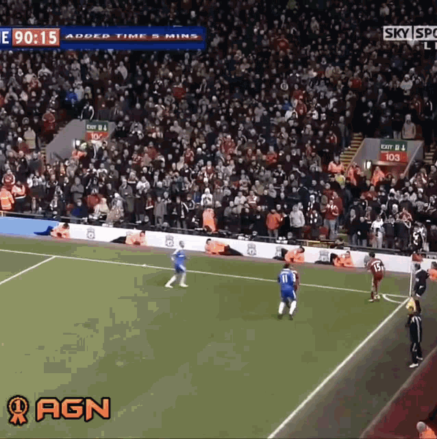 a soccer game is being played in front of a crowd and the score is 90-15