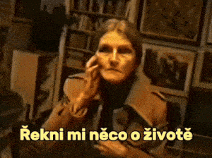 a woman talking on a cell phone with the words " rekni mi neco o zivote " on the bottom