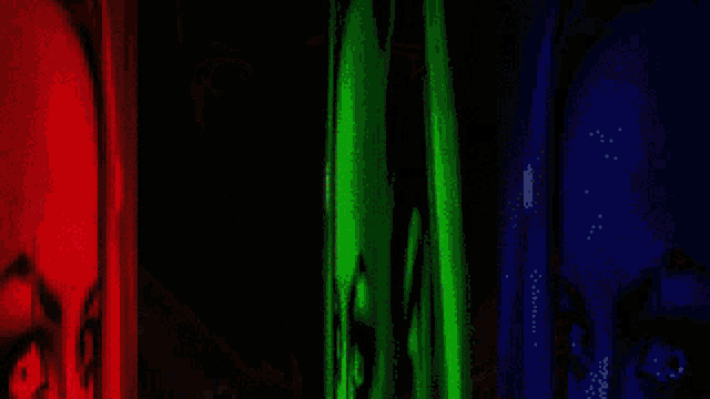a close up of a person 's face with a rainbow of colors coming out of it .