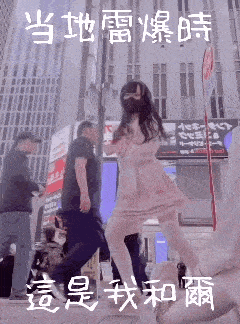 a girl in a pink dress is dancing in front of a sign that says ' a ' on it