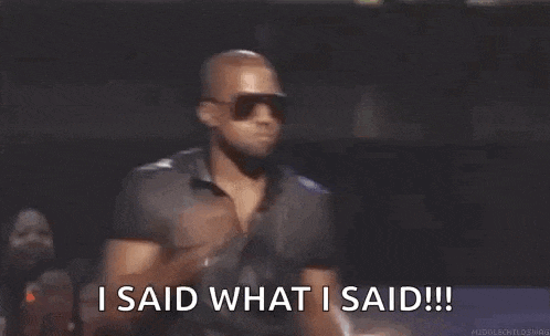 a man wearing sunglasses and a leather jacket is holding a microphone and saying `` i said what i said ! ''