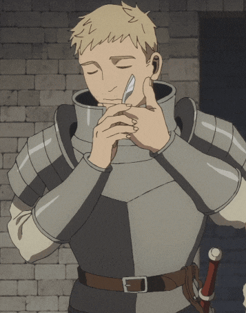 a man in armor with his eyes closed holds a knife to his face