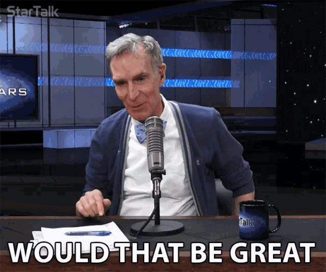 a man sitting in front of a microphone with the words " would that be great " above him