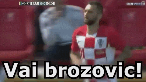 a soccer player in a red and white jersey says vai brozovic during a soccer game