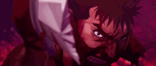 a close up of a man 's face with a sword in his hand .