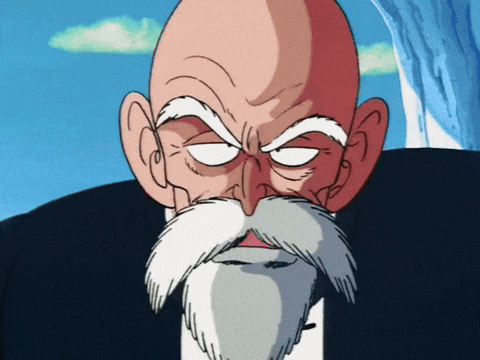 a bald man with a white beard and mustache