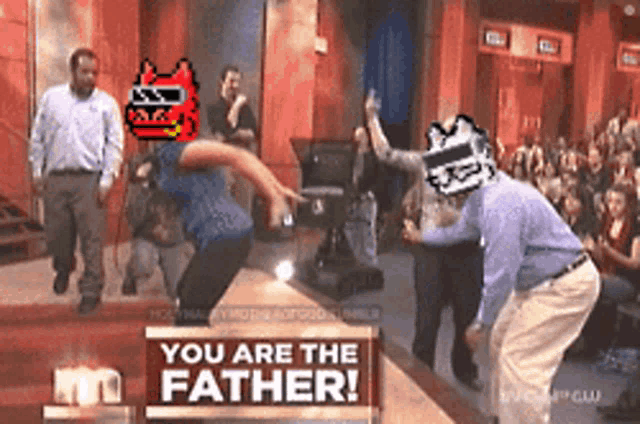 a sign that says you are the father is in front of a group of people