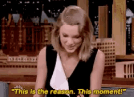 a woman in a black and white dress is saying this is the reason .