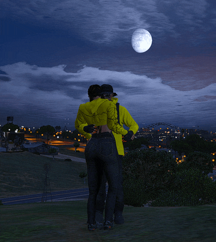 a man and a woman hugging under a full moon