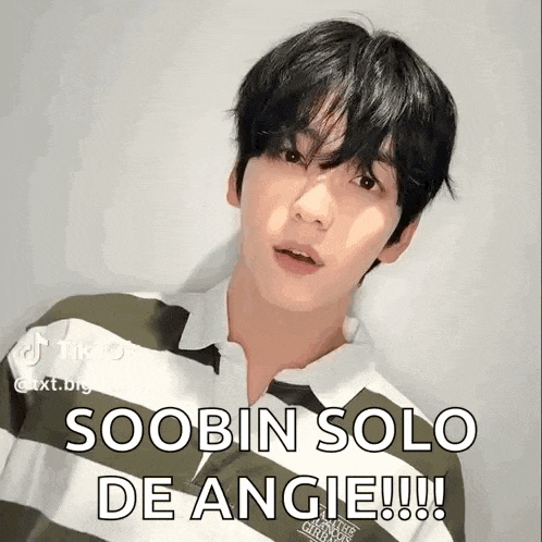 a young man with black hair is wearing a green and white striped shirt with the words soobin solo de angie written on it .