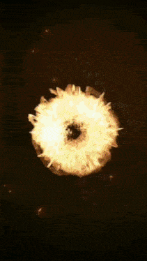 a blurred image of a fireball with the word wizard on the bottom right
