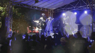a man singing into a microphone with the words agoz dha beat written below him