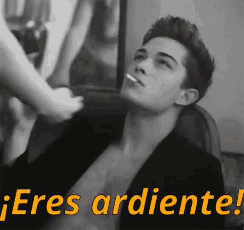 a black and white photo of a man smoking a cigarette with the words " eres ardiente " written above him