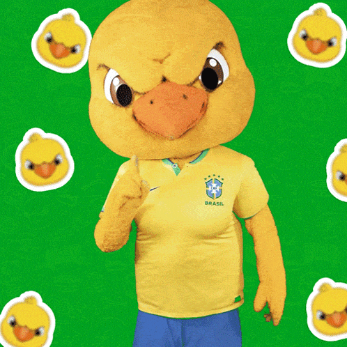 a yellow duck mascot is wearing a yellow shirt that says brasil