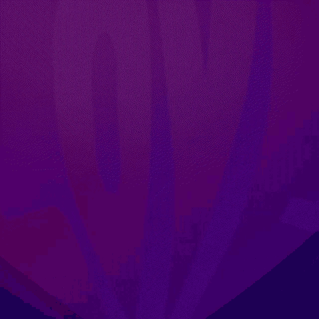 a purple and pink heart with the word love on it