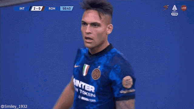 a soccer player in an inter fan token jersey