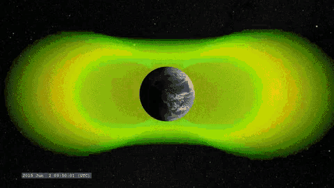 a computer generated image of the earth surrounded by green rings