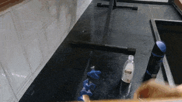 a bottle of neutrogena sits on a black counter