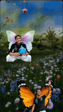 a man with butterfly wings is holding a trophy
