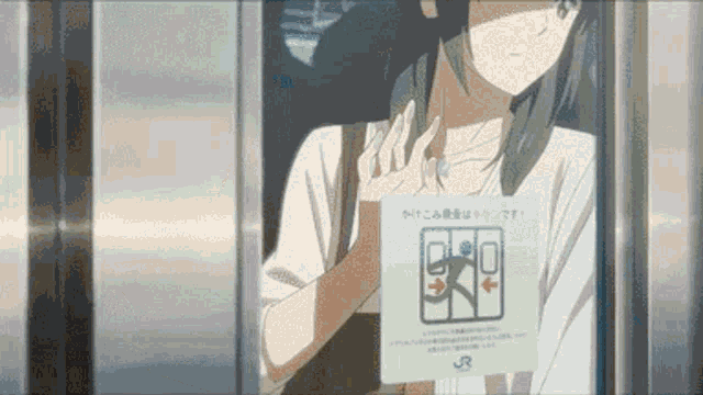 a woman is sitting in an elevator holding a sign that says jr