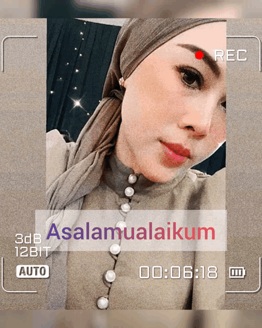 a recording of a woman with the words " assalamualaikum " written on it