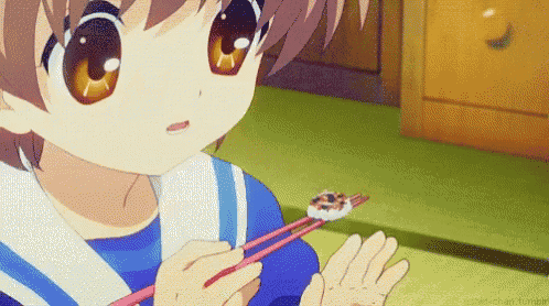 a little girl is eating sushi with chopsticks while wearing a blue and white uniform