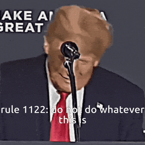 a man in a suit and tie stands in front of a microphone and says " rule 1122 "