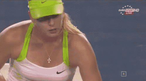 a woman wearing a green hat and a white tank top is on euro sport hd live