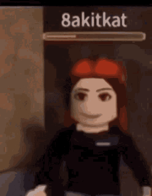 a girl with red hair and a black shirt is standing in front of a sign that says 8akitkat .