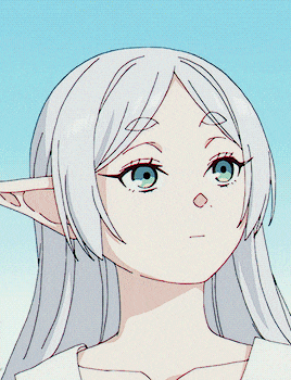 a girl with white hair and green eyes is being held by someone 's hand
