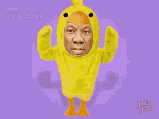 a man in a yellow duck costume is dancing .