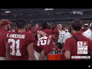 a group of football players including k. anderson