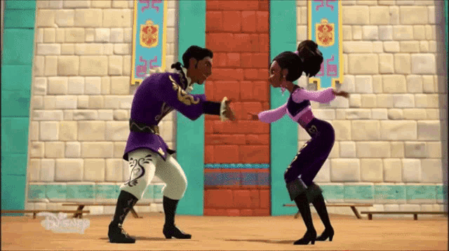 a man and a woman are dancing in front of a brick wall that says disney