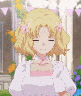 a girl in a white dress with pink flowers on her hair