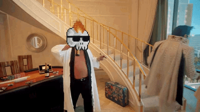 a man with a pixelated skull on his head stands in front of a staircase