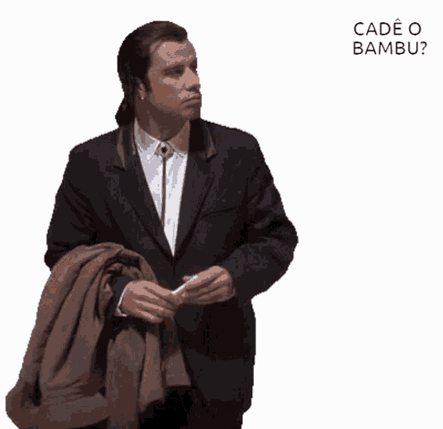 a man in a suit is holding a jacket over his shoulder and says cadé o bambu on the bottom
