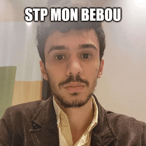 a man with a beard is wearing a brown jacket and a yellow striped shirt with the caption stp mon bebou