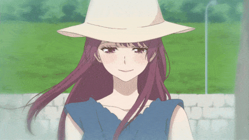 a girl with purple hair is wearing a hat and smiling