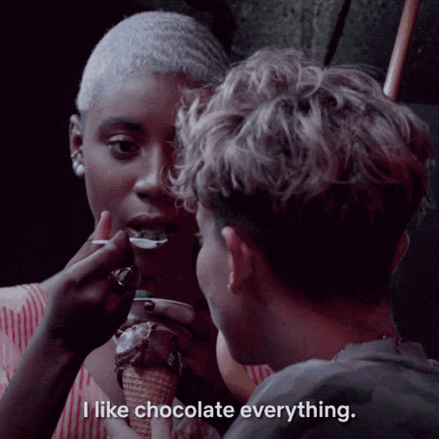 a woman eating an ice cream cone with the words " i like chocolate everything " below her