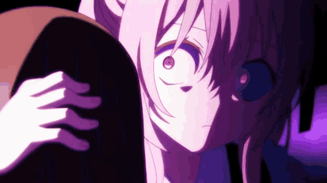 a girl with pink hair and a purple eye is holding a person in a dark room .
