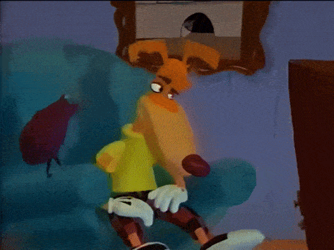 a cartoon dog is standing in front of a couch