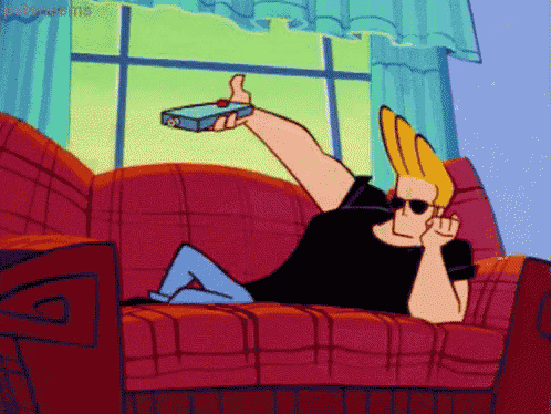 a cartoon character is laying on a couch holding a remote control and giving a thumbs up