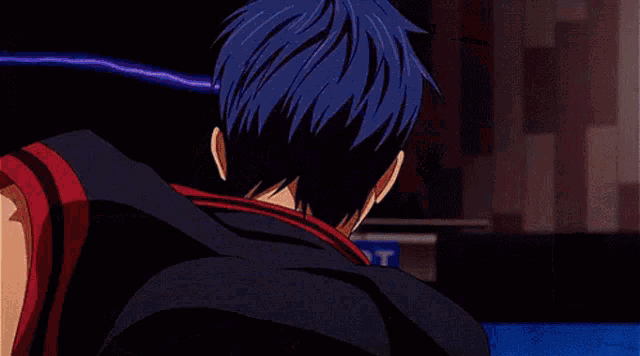 a man with red hair and a black shirt is fighting another man with red hair .