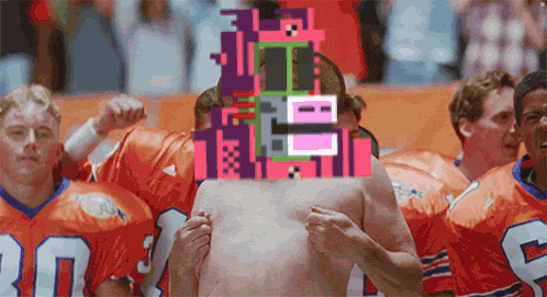 a group of football players wearing orange jerseys with the number 30 on them
