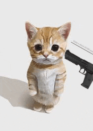 a small cat is standing on its hind legs next to a gun .