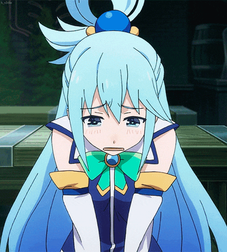 a girl with blue hair and a green bow on her outfit has a sad look on her face