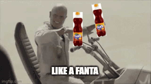 a man riding a motorcycle with two bottles of fanta hanging from the handlebars