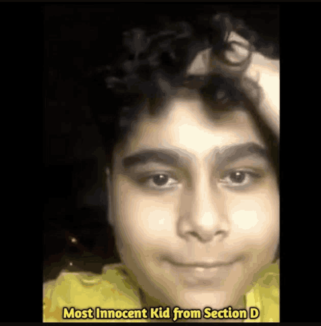 a close up of a boy 's face with the words `` most innocent kid from section d '' written on the bottom .